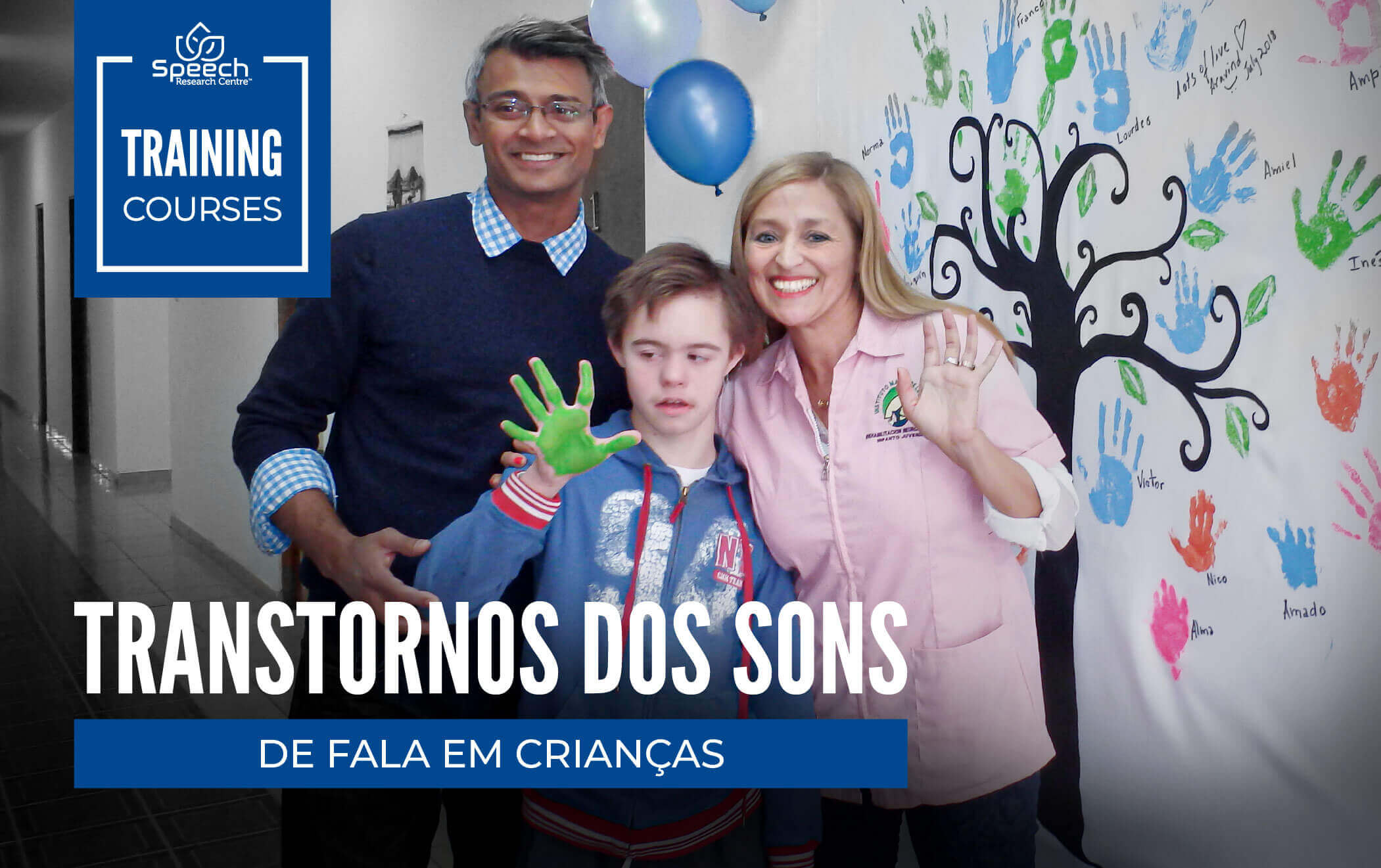 two instructors standing with a patient with down syndrome