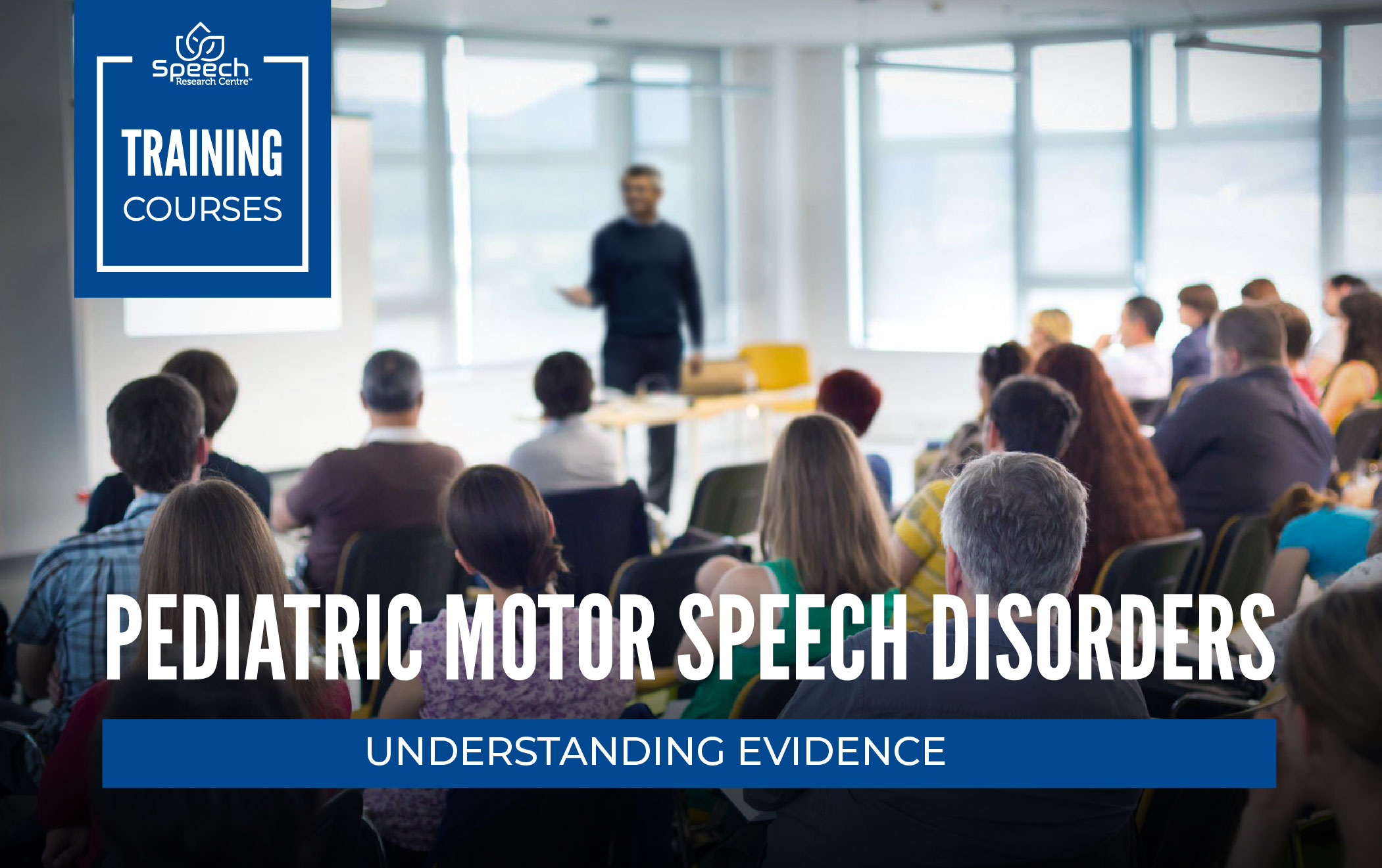 Professor presenting to a group of adults